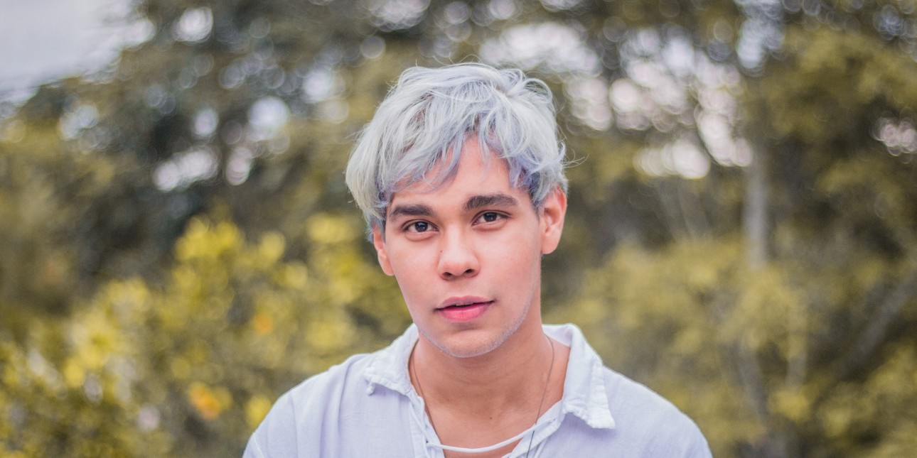 Young man with white hair