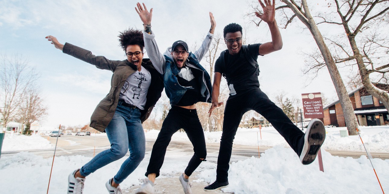 Three youth jumping