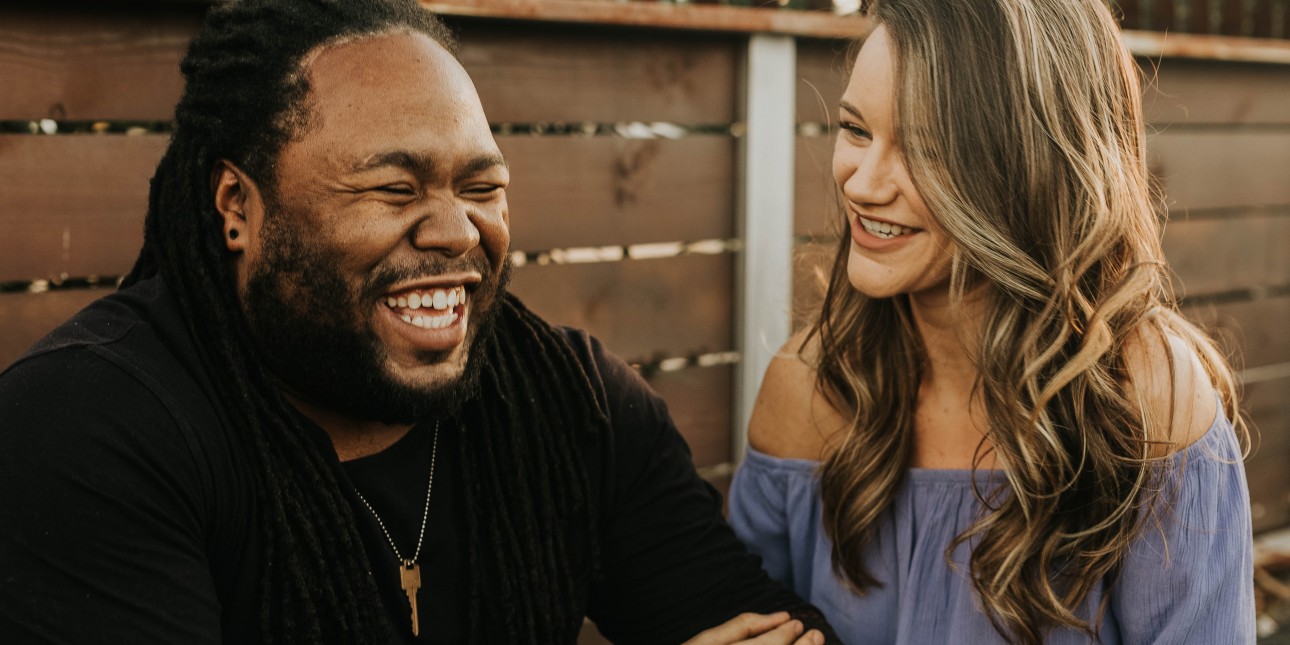 a couple laughing together