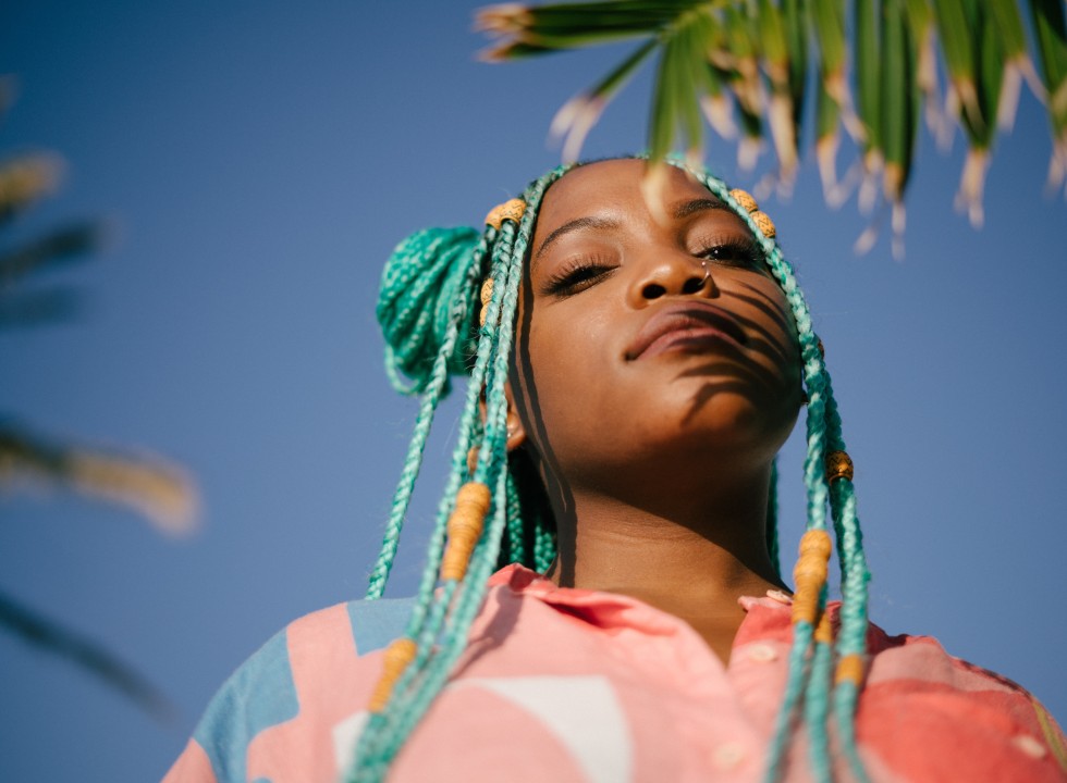 Black girl with teal hair