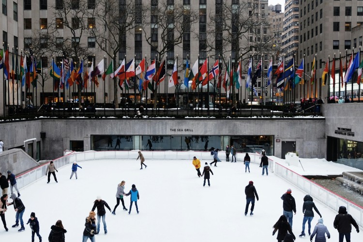 People ice skating at Rockefeller Plaza in New York City